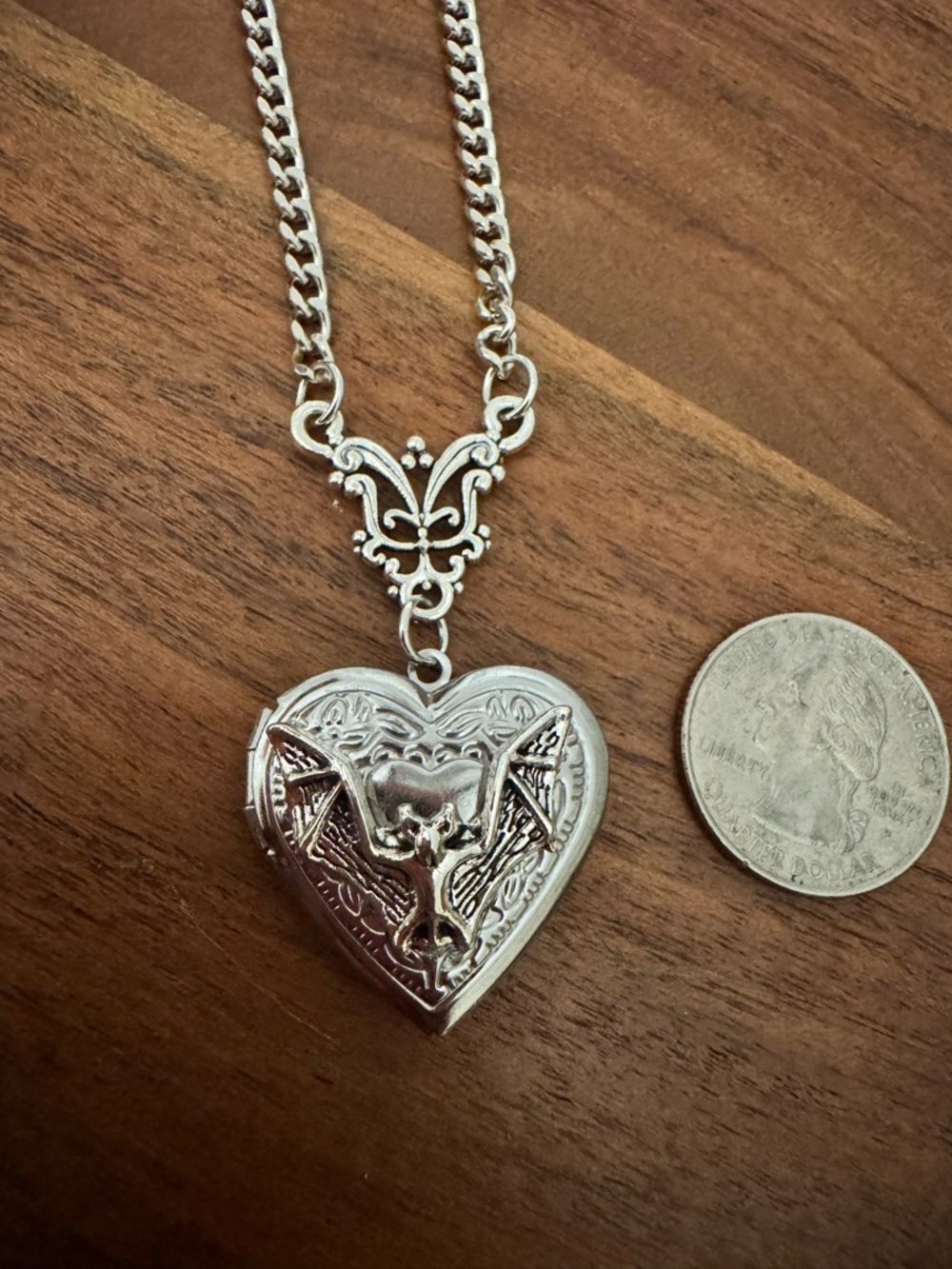 Heart shaped bat open locket necklace